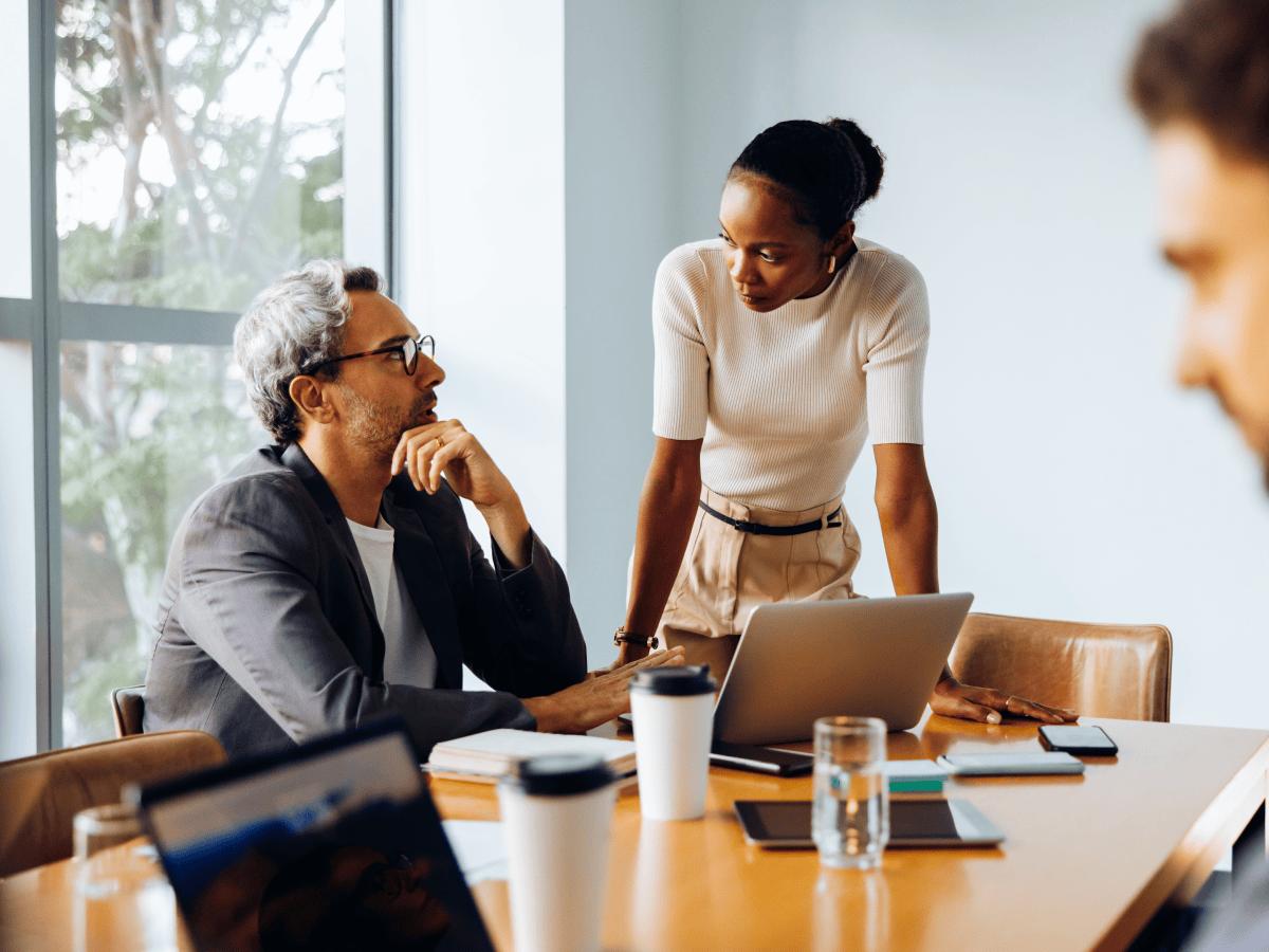 Colleagues in a meeting around a table