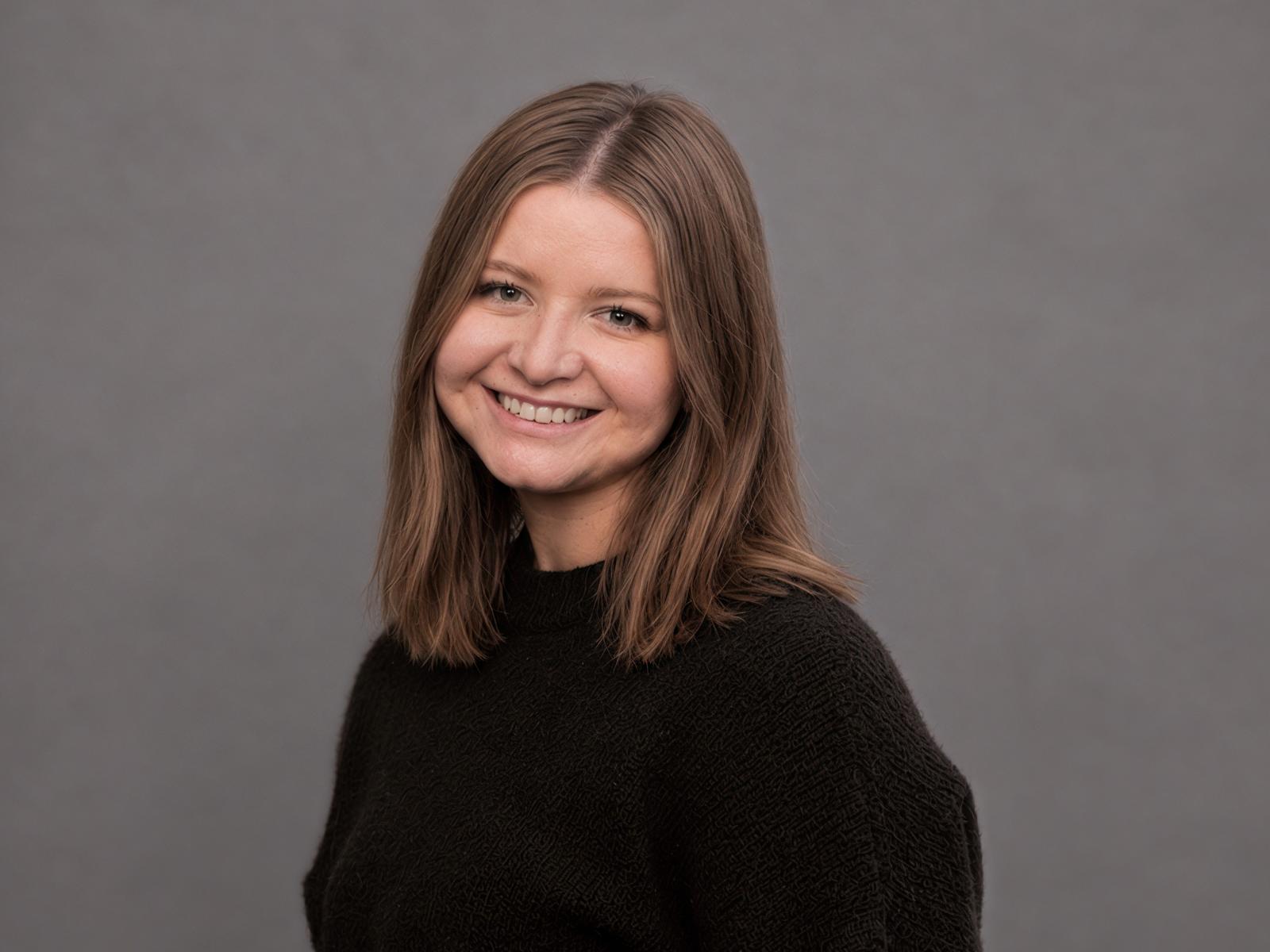 Portrait of a smiling Draftable team member