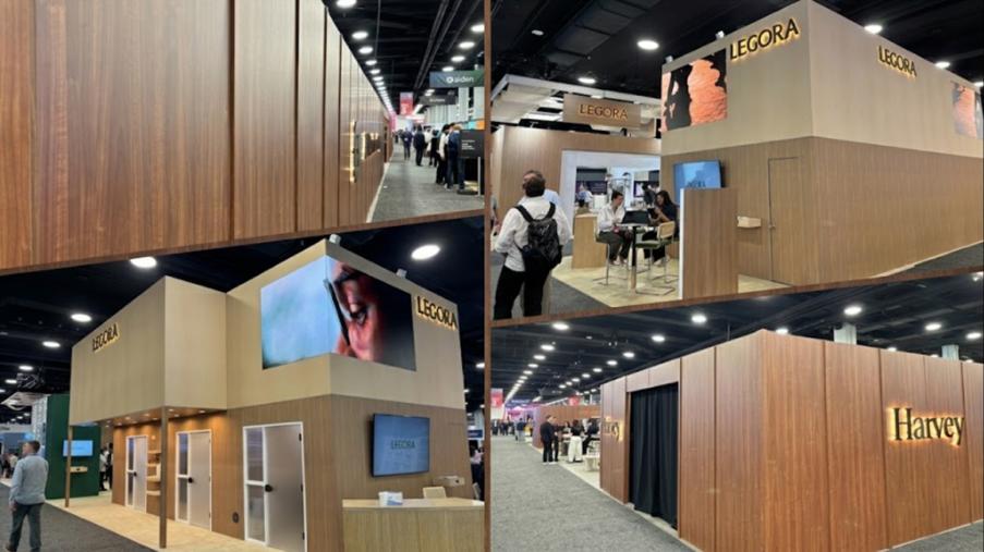 Exhibition hall booths at a legal technology conference