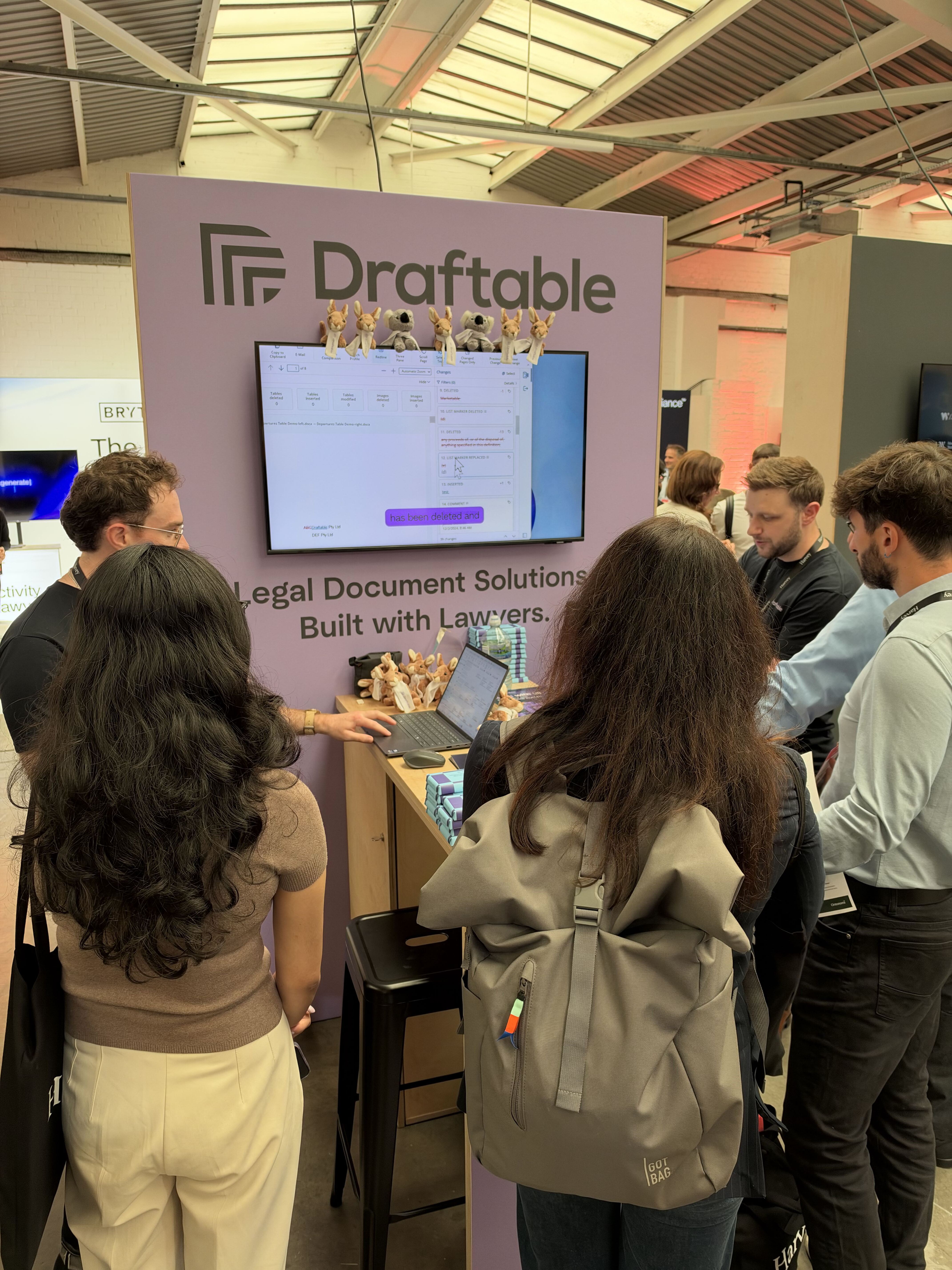 Draftable team mid-demo at LegalGeek stand in London